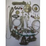 A collection of silver jewellery including a fringe necklace, a charm bracelet, a child's bangle and