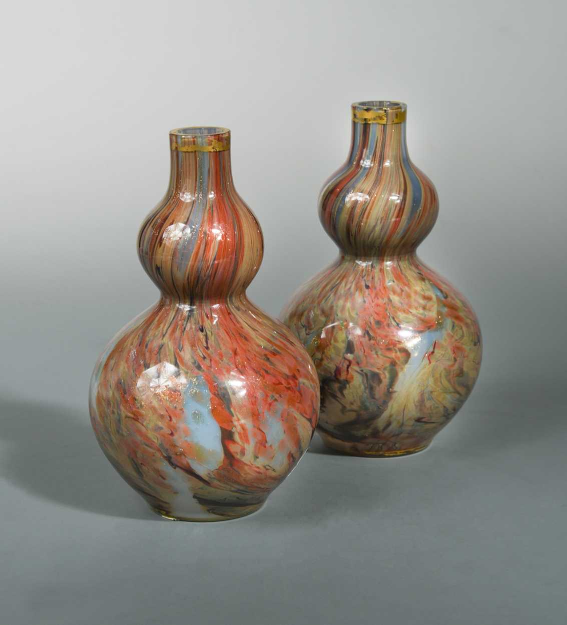 A pair of possibly 19th century French coloured glass and gilt double gourd vases, 18.5cm high