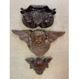 Two carved cherubic wall brackets, late 17th or early 18th century,