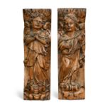 A small pair of late 16th or early 17th century carved caryatids,