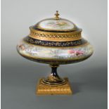 A French porcelain and gilt metal mounted pedestal vase and cover, probably Sevres,
