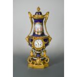 A 19th century French porcelain and ormolu mounted vase-shape clock and cover, probably Sevres,