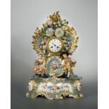 Jacob Petit, a turquoise cartouche shaped mantel clock and stand,