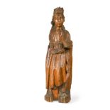 A carved limewood saint, 17th century