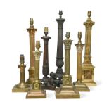 Six assorted brass columnar table lamps,