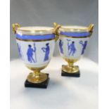 A pair of French porcelain two-handled neoclassical vases,