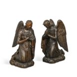 A pair of Continental 17th century carved softwood kneeling angels,