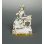 A 19th century Meissen figure allegorical of scent,