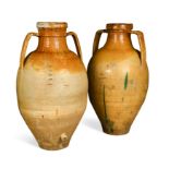 A near pair of large twin-handled ovoid Mediterranean olive jars,
