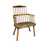 A primitive comb back armchair, 18th century,