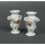 A pair of 18th century Derby patch mark miniature rococo vases,