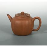 A Chinese Yixing melon shape teapot, cover, and internal strainer, late Qing Dynasty,