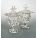 A pair of 19th century Irish cut glass pedestal vases and covers,