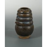 A Chinese brown phosphatic glazed pottery jar, Tang Dynasty style,