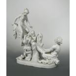 A Naples white glazed porcelain figural group,