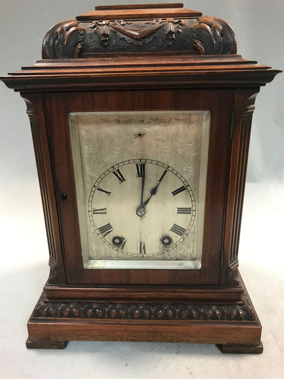 A late 19th century mahogany mantel clock,