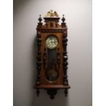 A Vienna style oak wall clock,