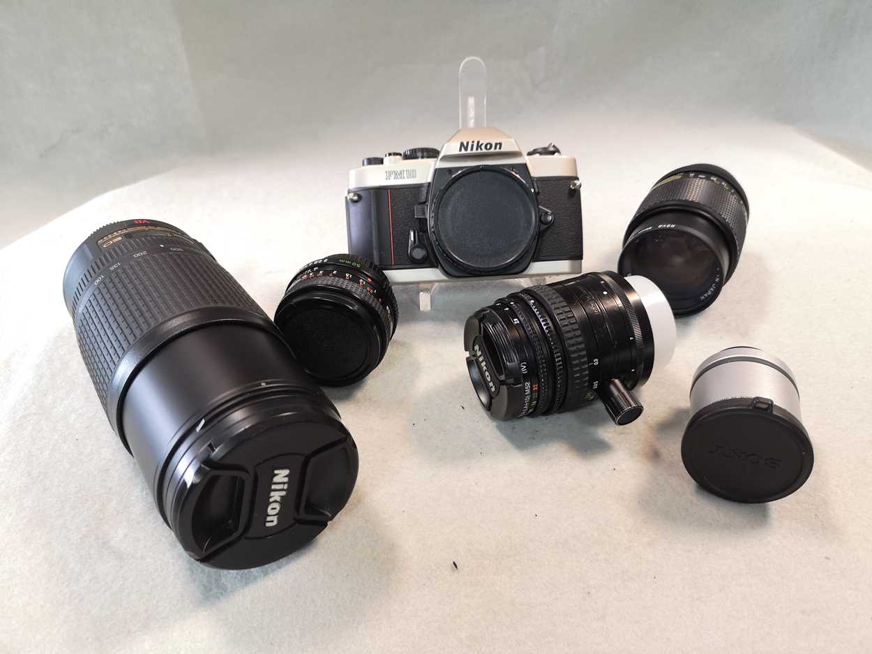 A collection of Nikon 35mm cameras and lenses, - Image 4 of 4