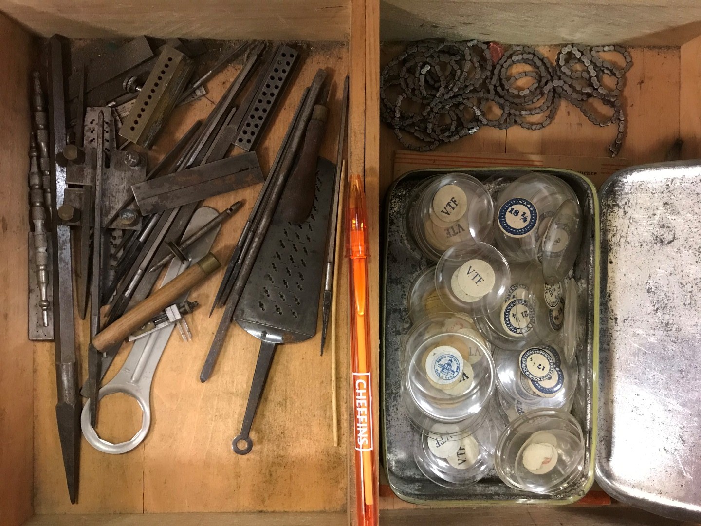 A cabinet of watchmaker's spare parts, watch movements, tools and oddments, circa 1900, the two - Image 6 of 9