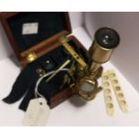 A miniature brass travelling microscope by Cary, early 19th century,