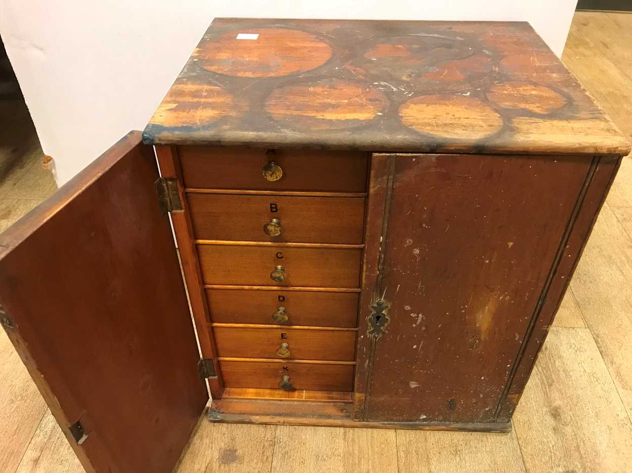 A cabinet of watchmaker's spare parts, watch movements, tools and oddments, circa 1900, the two - Image 2 of 9