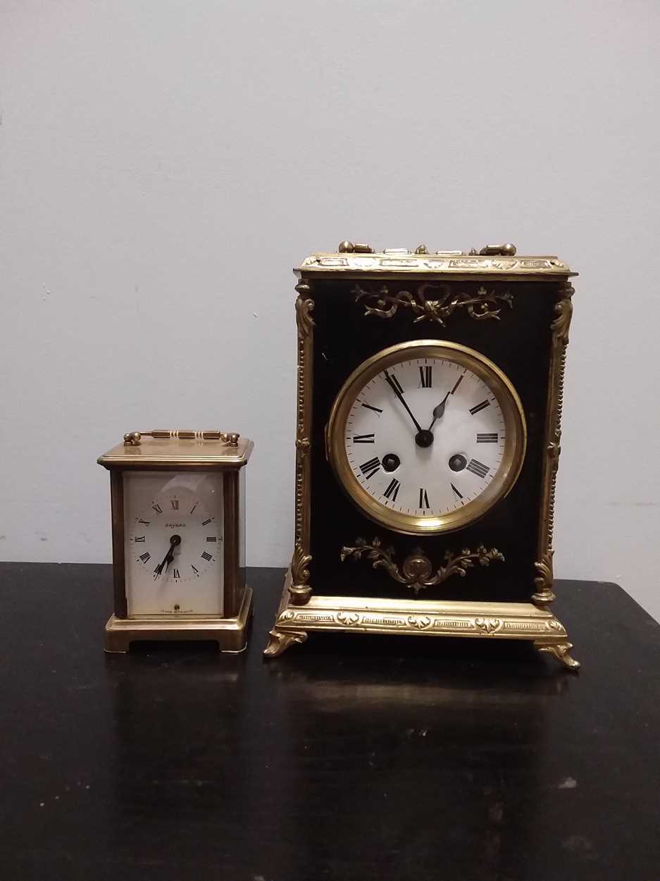 A French late 19th century ebonised and gilt metal mantel clock,