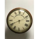 A Victorian mahogany circular wall clock,