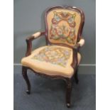 A modern show wood open armchair with tapestry seat and back depicting birds and flora