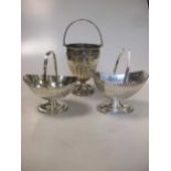 Three Victorian silver swing handled sugar baskets, 13.9ozt gross (3)