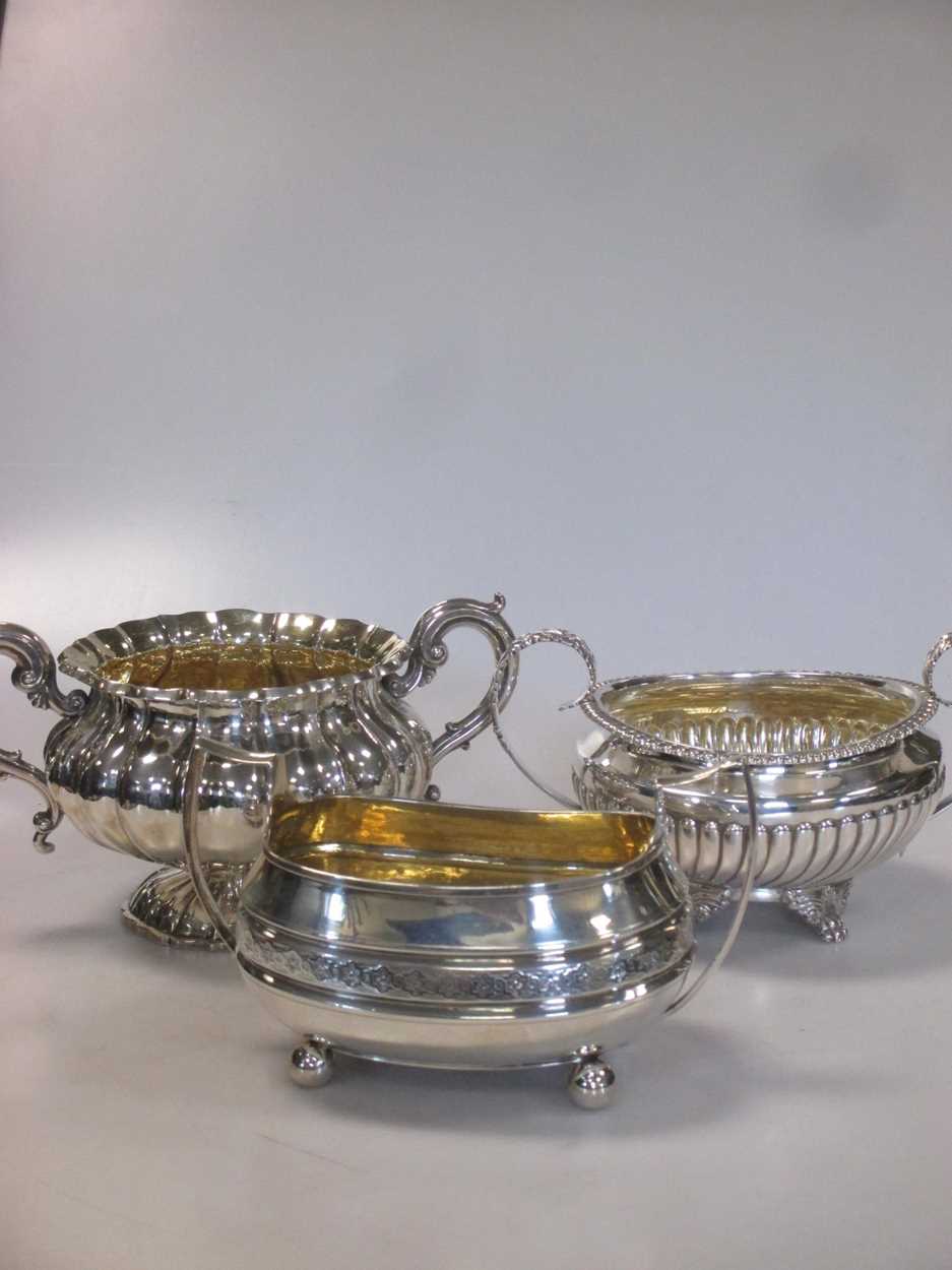 Three Georgian silver sugar bowls. 33.3ozt gross (3)