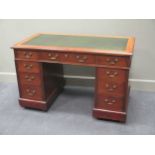 A late Victorian mahogany twin pedestal desk of nine drawers, with key 77 x 122 x 66cm