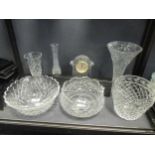 Items of Waterford glass to include a clock, cake knife, two bowls and four vases