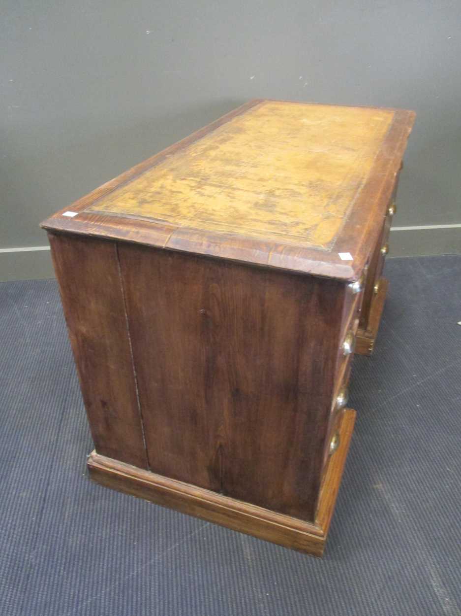 An ask and oak twin pedestal desk, early 20th century, 122cm wide - Image 4 of 5