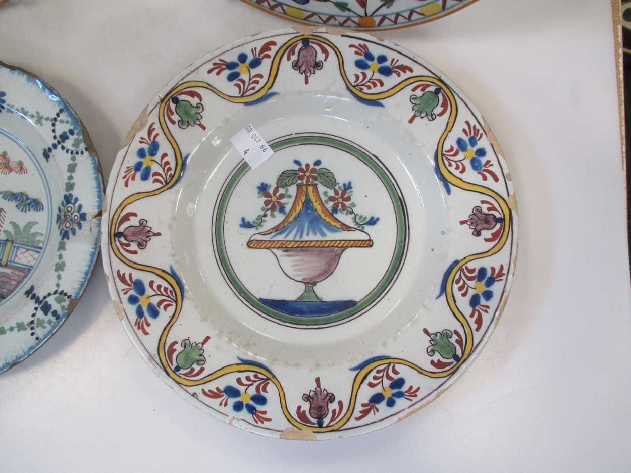 A pair of Continental tin glazed dishes and two Delft plates (4) - Image 11 of 12