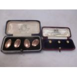 A pair of 9ct gold cufflinks 5g, together with a cased set of three shirt studs marked '18ct' 2.5g