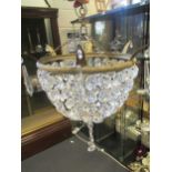 A glass 'crystal' bead ceiling basket light, two smaller similar and a pair of 1950's wall lights,