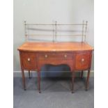 A 19th century mahogany bow fronted sideboard on square tapered legs 139 x 138 x 65cm