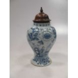 An 18th century Delft blue and white vase 30cm high with lid