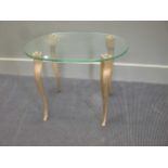 A glass top coffee table on gilt legs 40 x 60 x 45cm