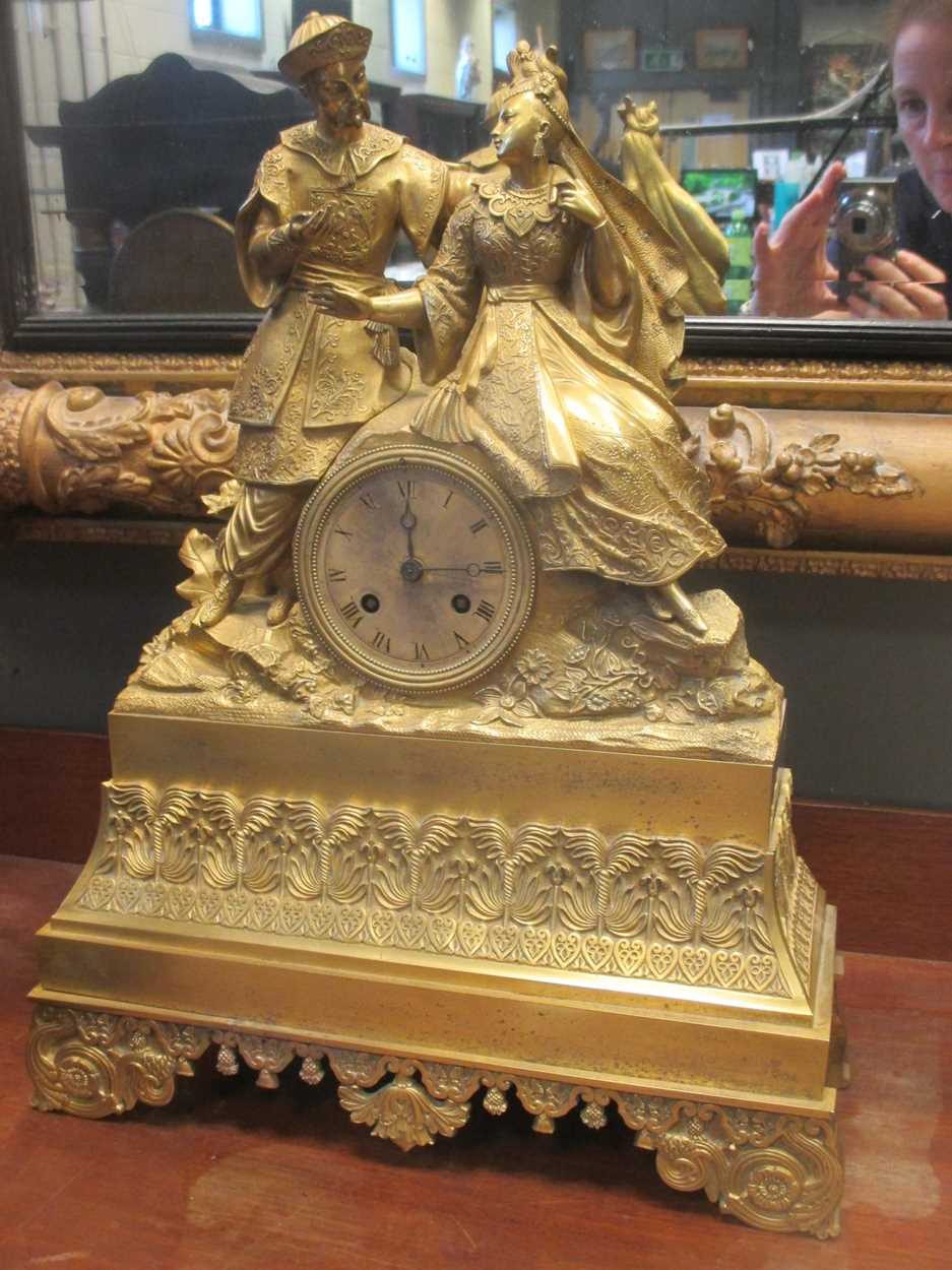 A 19th century French ormolu mantle clock with Chinese figural group 45cm high