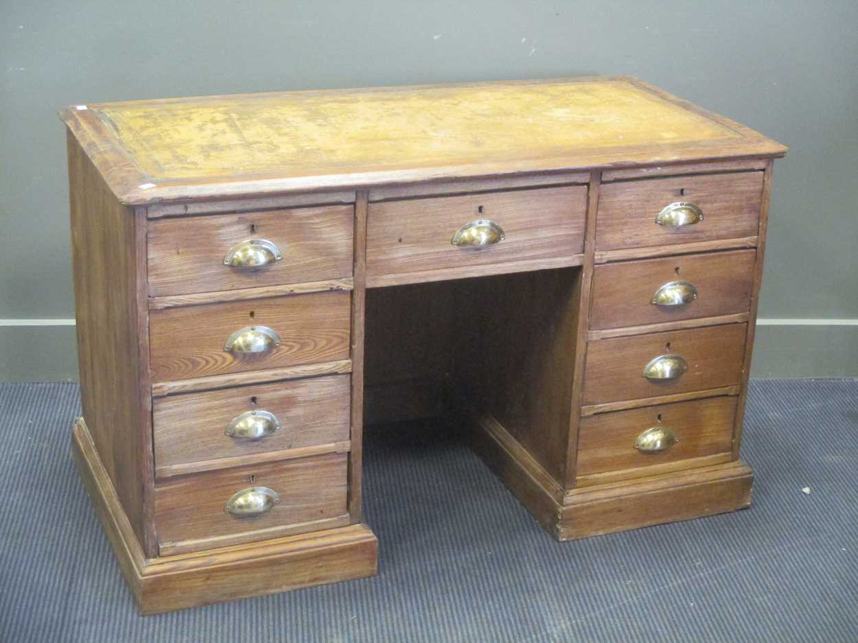 An ask and oak twin pedestal desk, early 20th century, 122cm wide