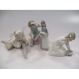 Four Lladro figures, to include a Ballerina, a girl holding a pig etc