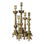 Six various 18th and 19th century bronze candlesticks,