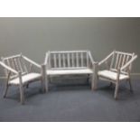 A set of rustic garden furniture, to include a two seater and two one seaters (3)