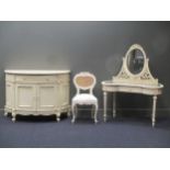 A white painted bedroom suite, to include a bow fronted cabinet, a caned back chair and a mirrored