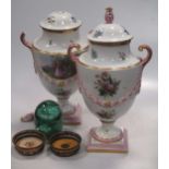 A pair of Continental urns and covers decorated with figures and raised festoon work, 37cm high,
