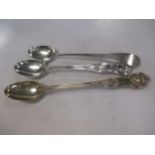 A Georgian and two Victorian silver basting spoons 17ozt gross (3)