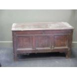 An 18th century oak coffer 67 x 123 x 54cm