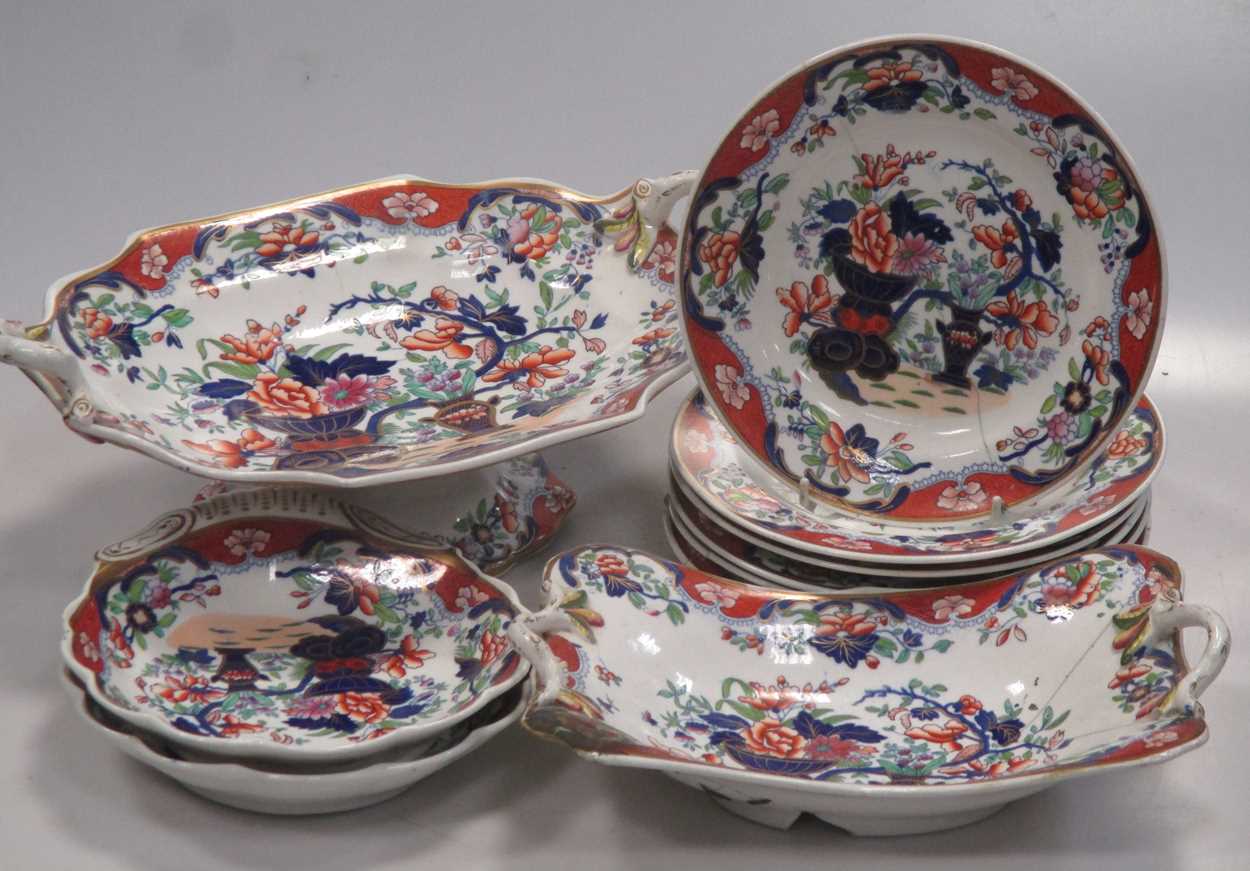 A Spode ironstone part desser service, floral decoration in colours, 14 pieces, some damage; also