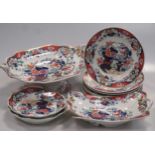 A Spode ironstone part desser service, floral decoration in colours, 14 pieces, some damage; also